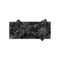 Adjustable black baby headband featuring a white cobweb and star print with a soft cotton tie-knot design.