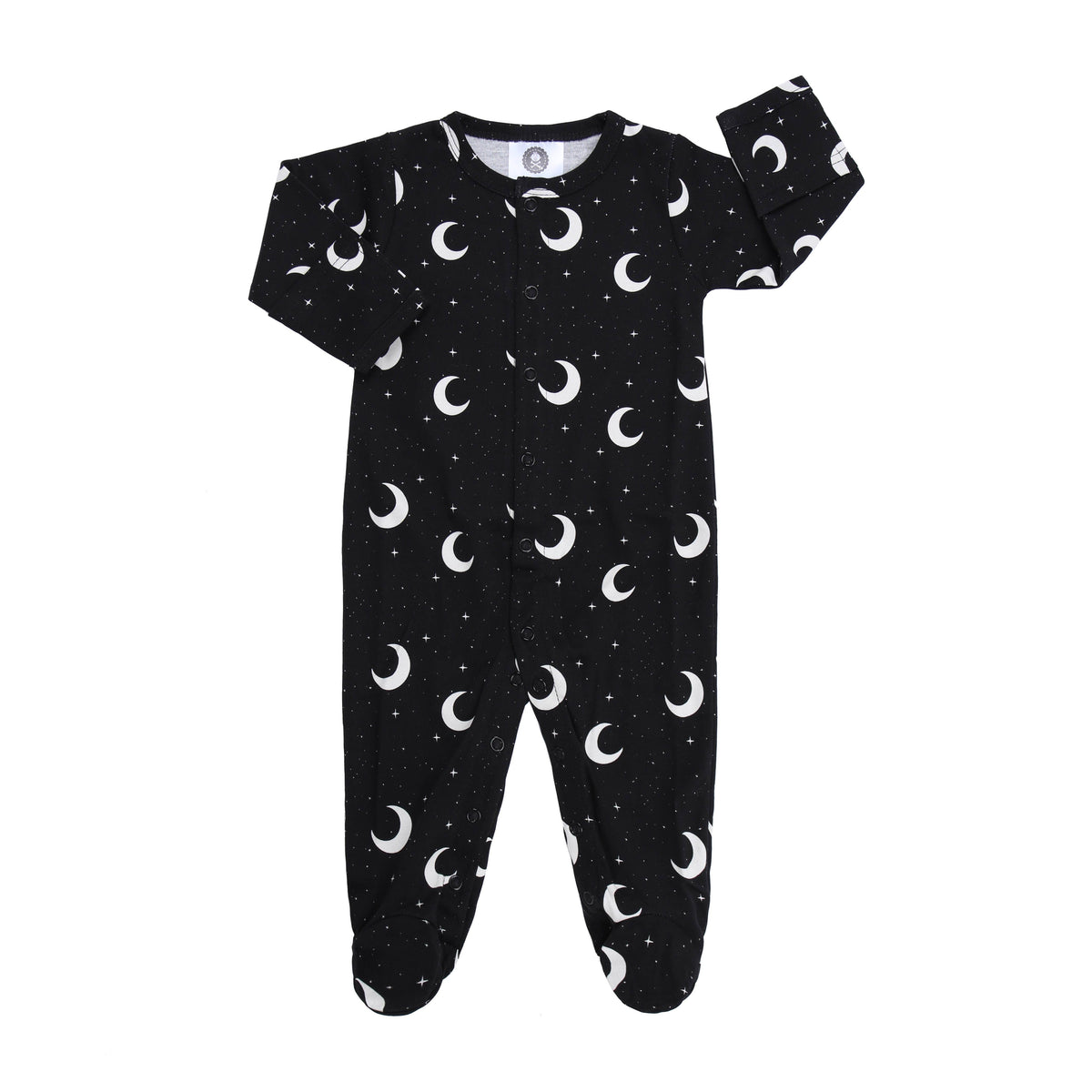 Black cotton baby sleepsuit with white moon and star print, front poppers, and integrated mittens, size 6-12 months.