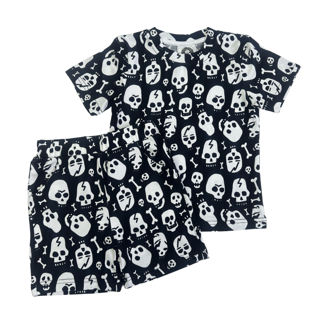 Black and white cotton skull and bone print toddler shorts and t-shirt set with elastic waistband.