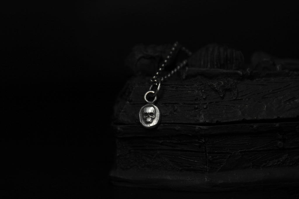 Tiny Sterling Silver Vampire Skull Pendant
