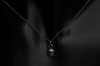 Tiny Sterling Silver Vampire Skull Pendant