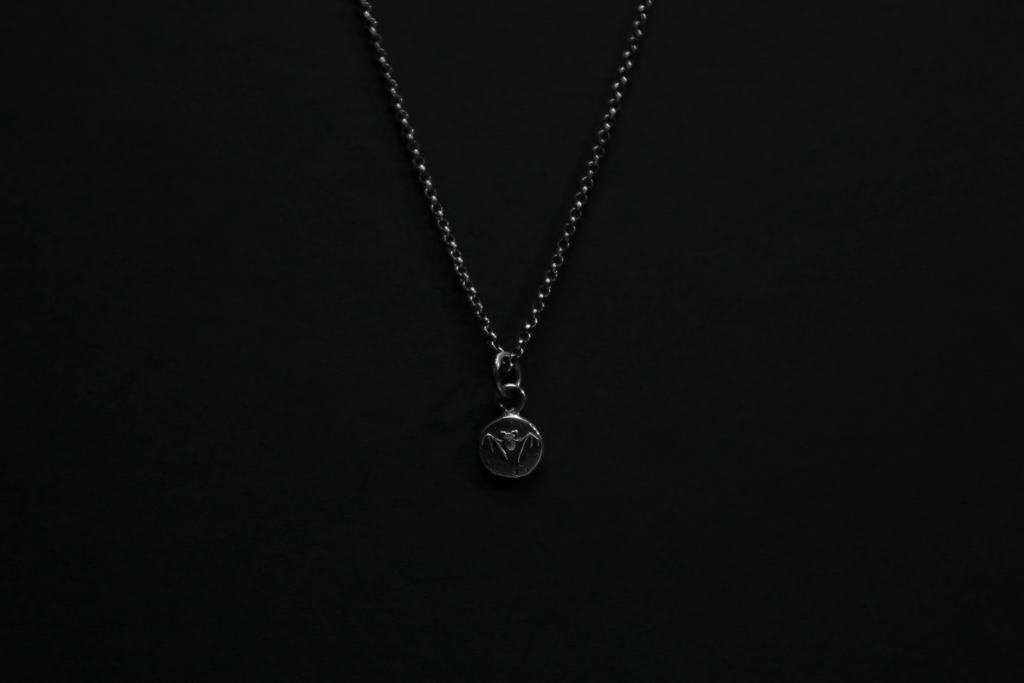 Tiny Sterling Silver Vampire Bat Pendant
