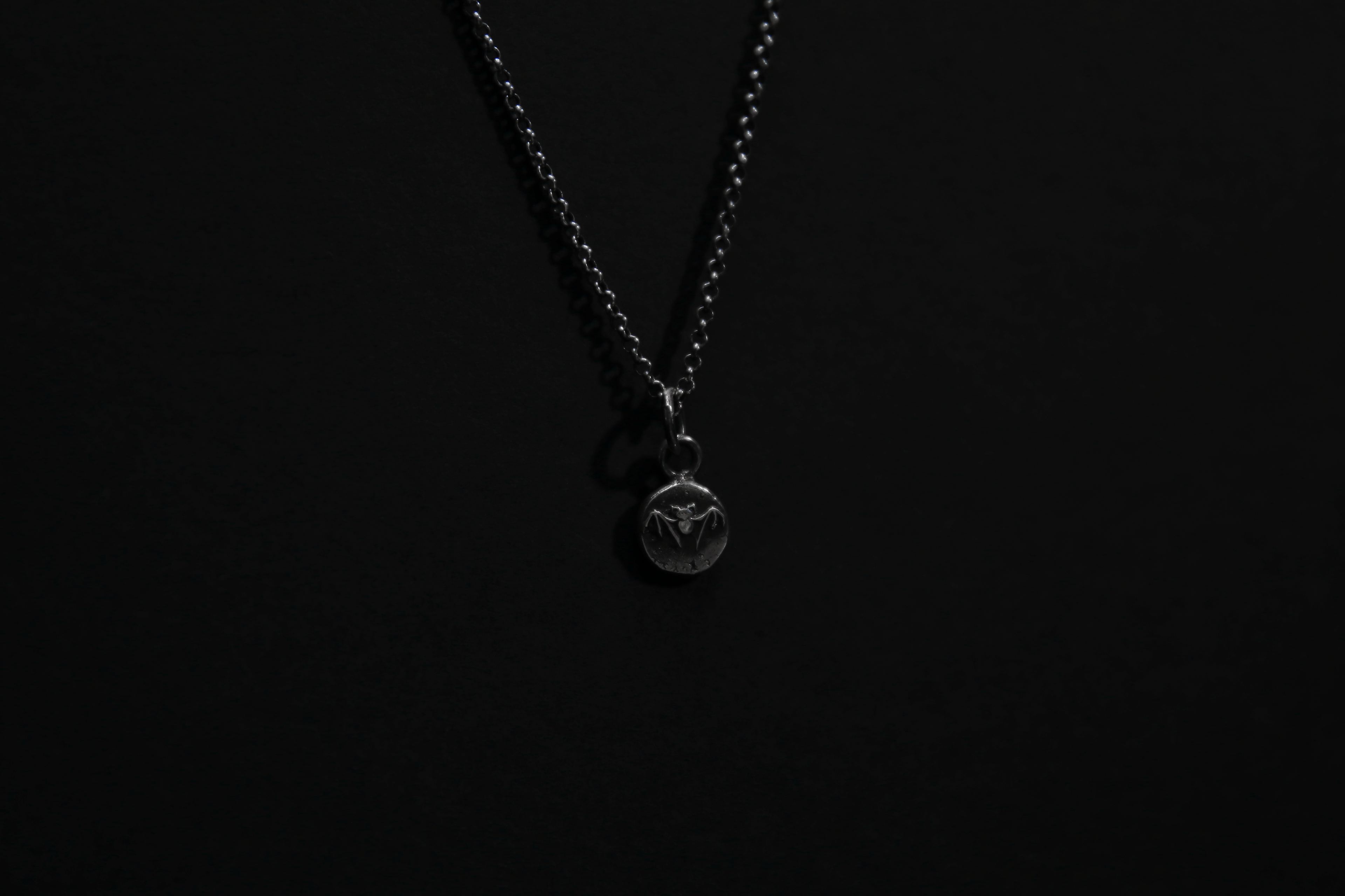 Tiny Sterling Silver Vampire Bat Pendant