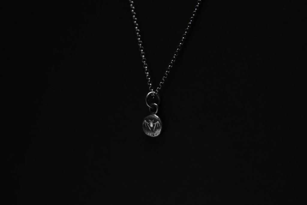 Tiny Sterling Silver Vampire Bat Pendant