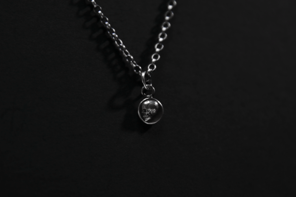 Tiny Sterling Silver Memento Mori Skull Pendant