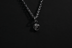 Tiny Sterling Silver Memento Mori Skull Pendant