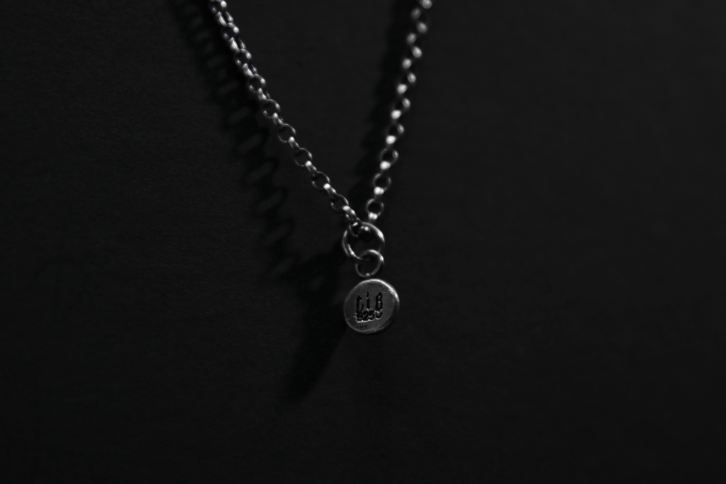 Tiny Sterling Silver Memento Mori Skull Pendant