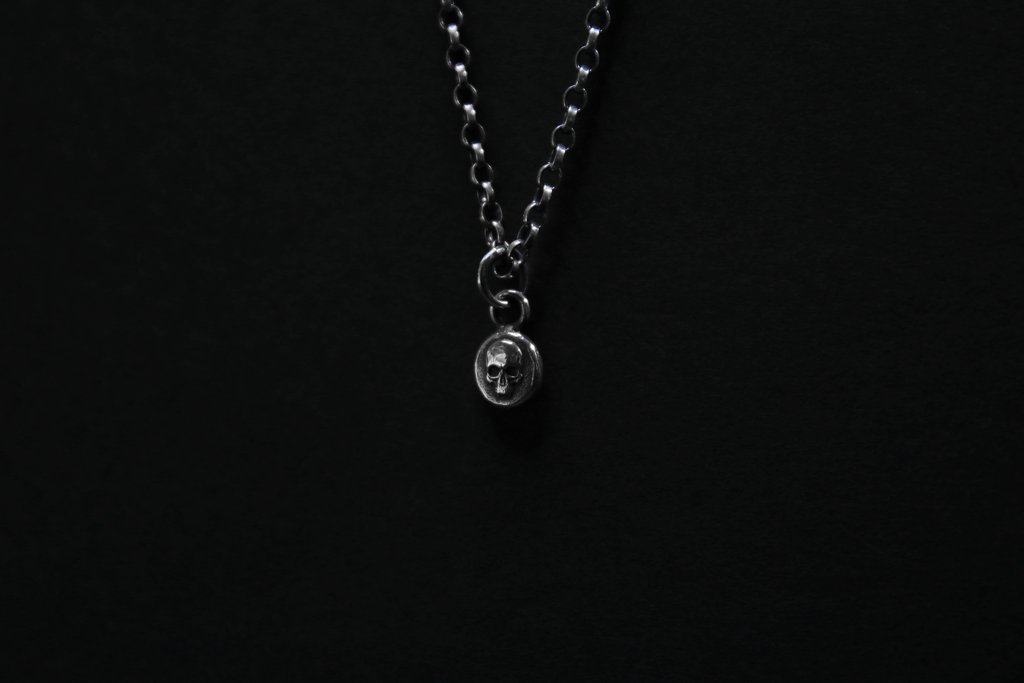 Tiny Sterling Silver Vampire Skull Pendant