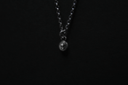 Tiny Sterling Silver Vampire Skull Pendant