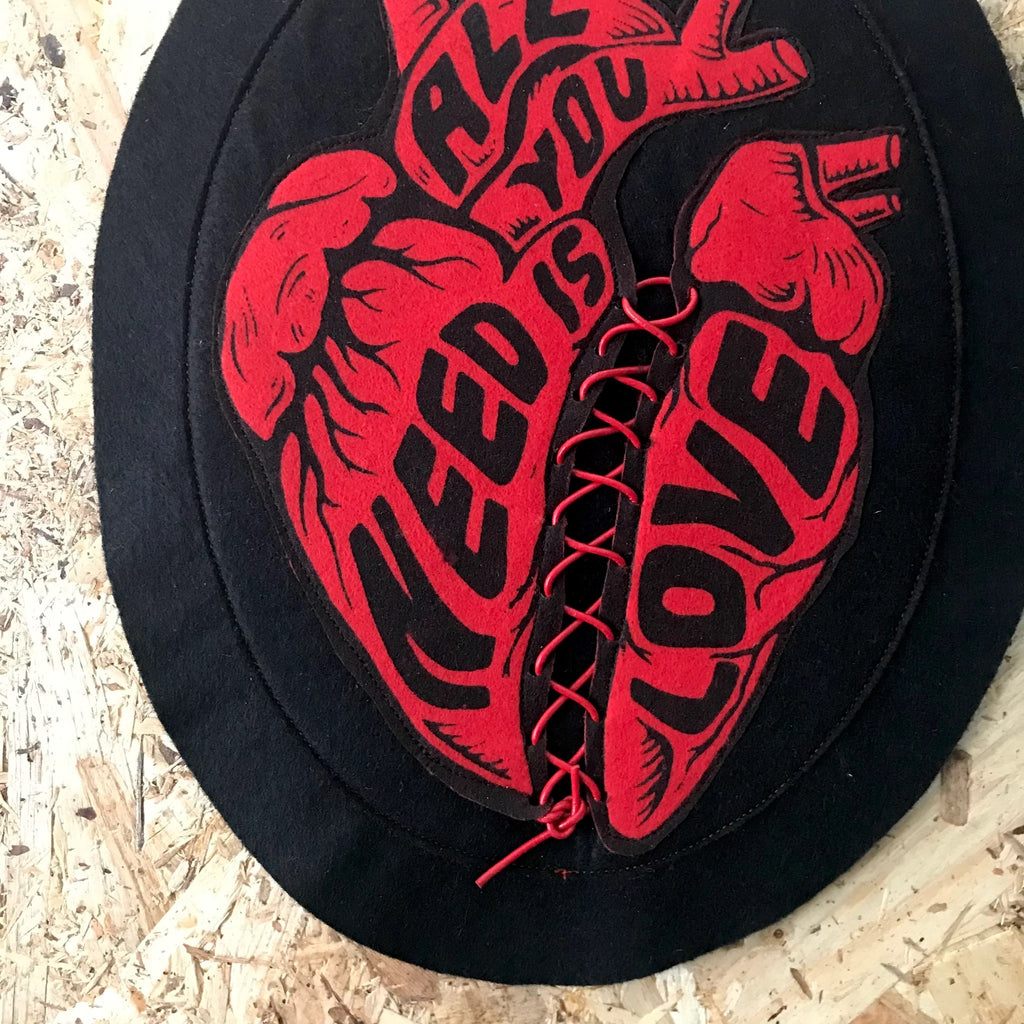 Red Anatomical Heart “All You Need Is Love” Felt Wall Hanging