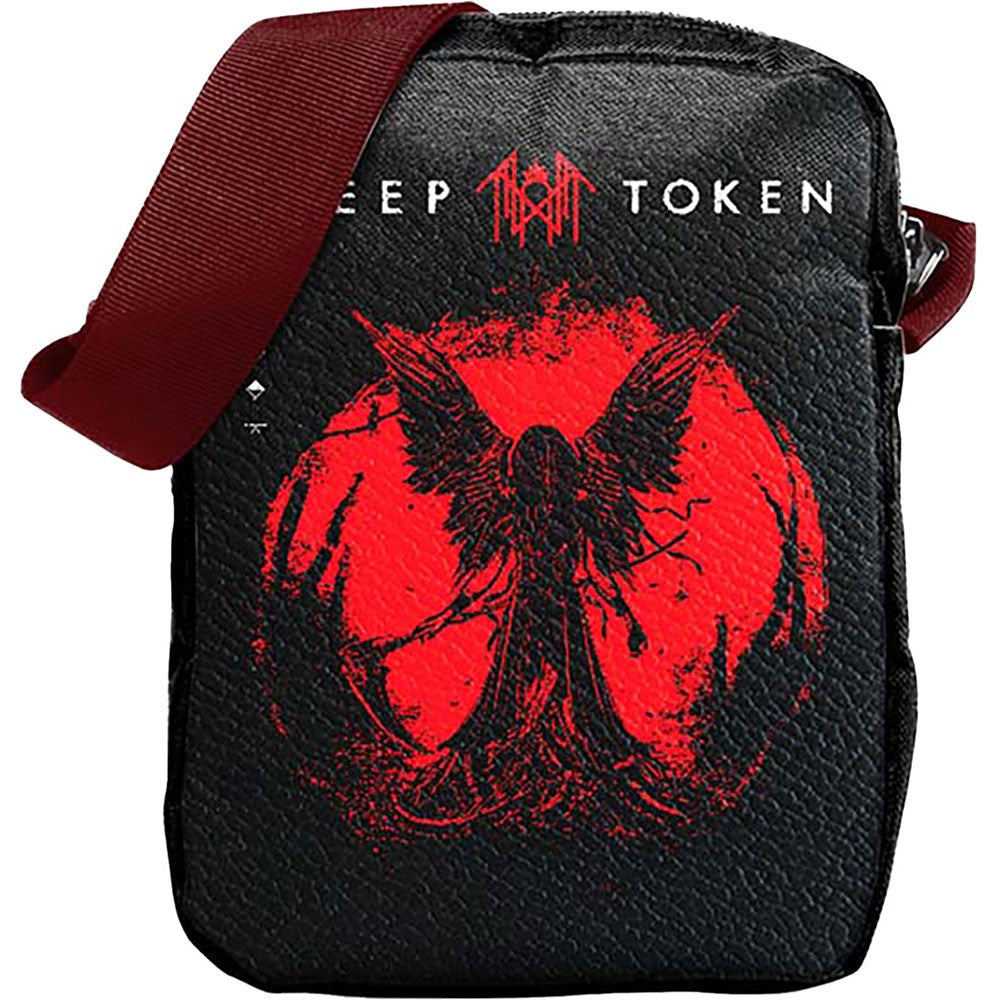 Black bag with red and white design featuring text and a symbol 